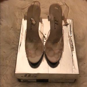 Competition Clear Heels